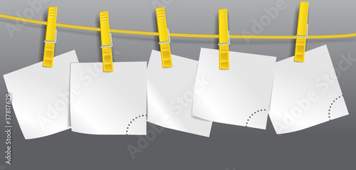 Blank paper sheets on rope
