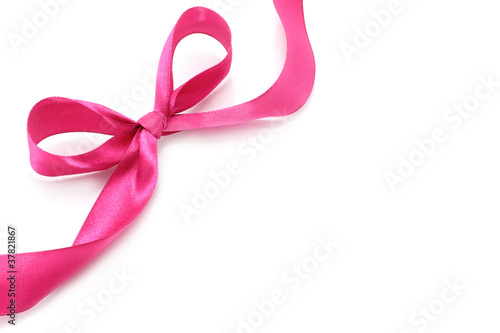 Big pink holiday bow on white background