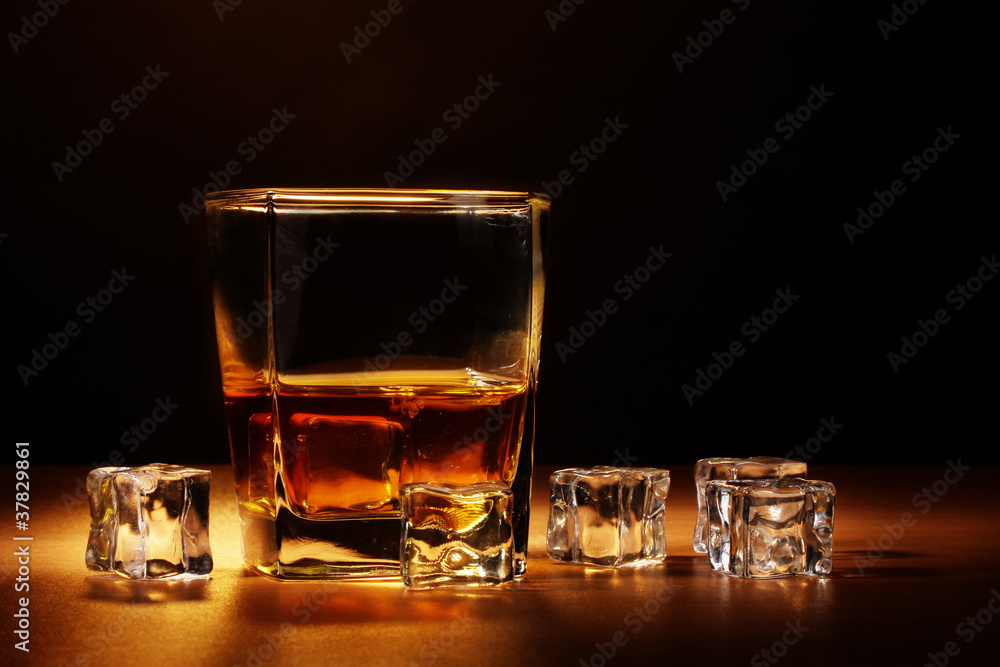 glass of scotch whiskey and ice glass of scotch whiskey and ice