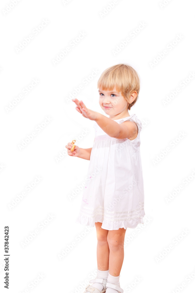 Little girl in white dress with bagel Little girl in white dress with bagel