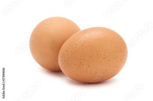 Two fresh brown eggs