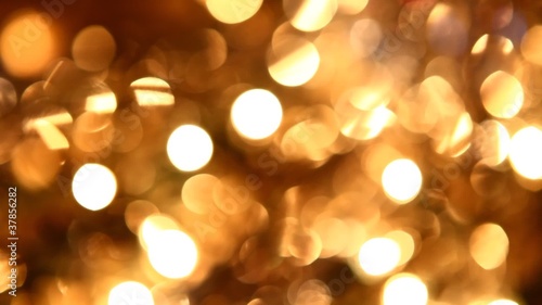 golden twinkle lights background photo