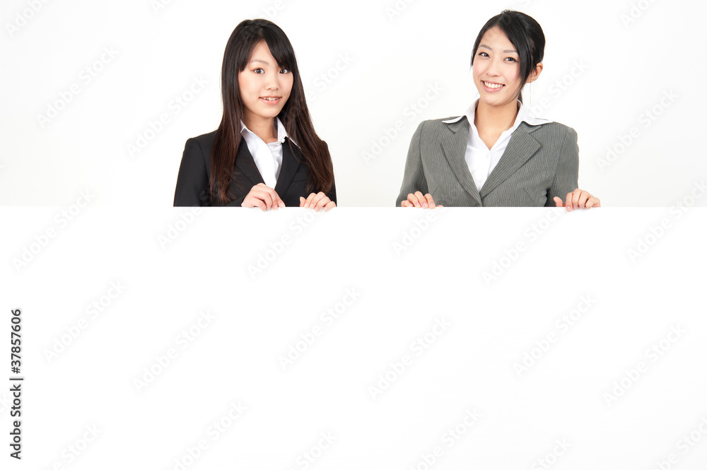 asian businesswomen with blank whiteboard asian businesswomen with blank whiteboard
