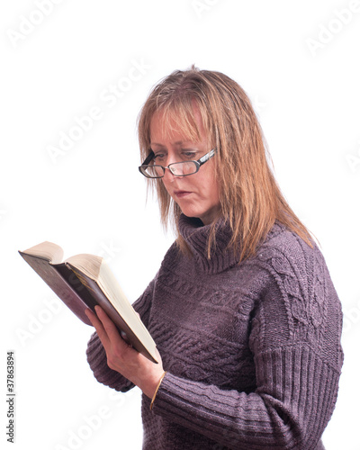 Woman reading book.