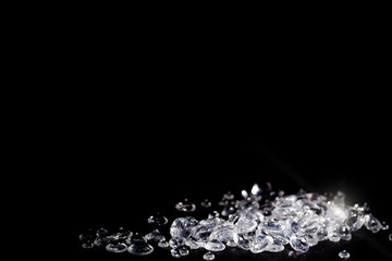 Diamonds on a black background with copy space