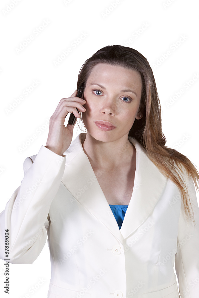 Businesswoman at Talking on the Cell Phone at Work Businesswoman at Talking on the Cell Phone at Work