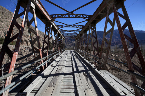 Iron bridge to Pucara fortress in Tilcara, Jujuy province in Argentina, South America photo