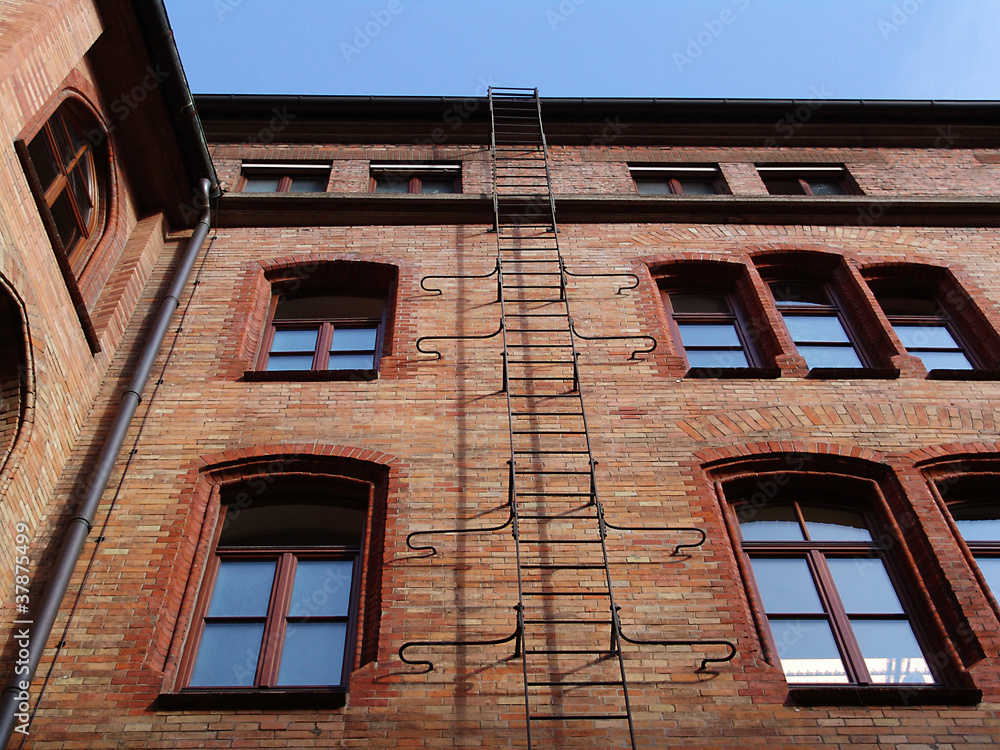 Fototapeta premium fire-escape ladder on an old building