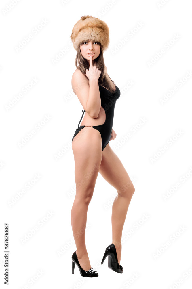 Attractive woman wearing swimsuit and fur-cap Attractive woman wearing swimsuit and fur-cap