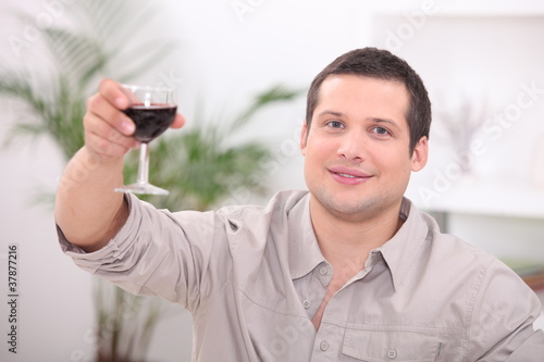 Photos Man drinking wine alone