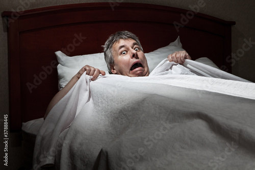 Quadro em tela Man startled awake by intruder