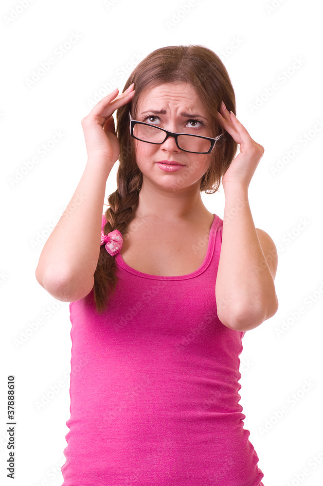 girl with terrible headache holding head in pain