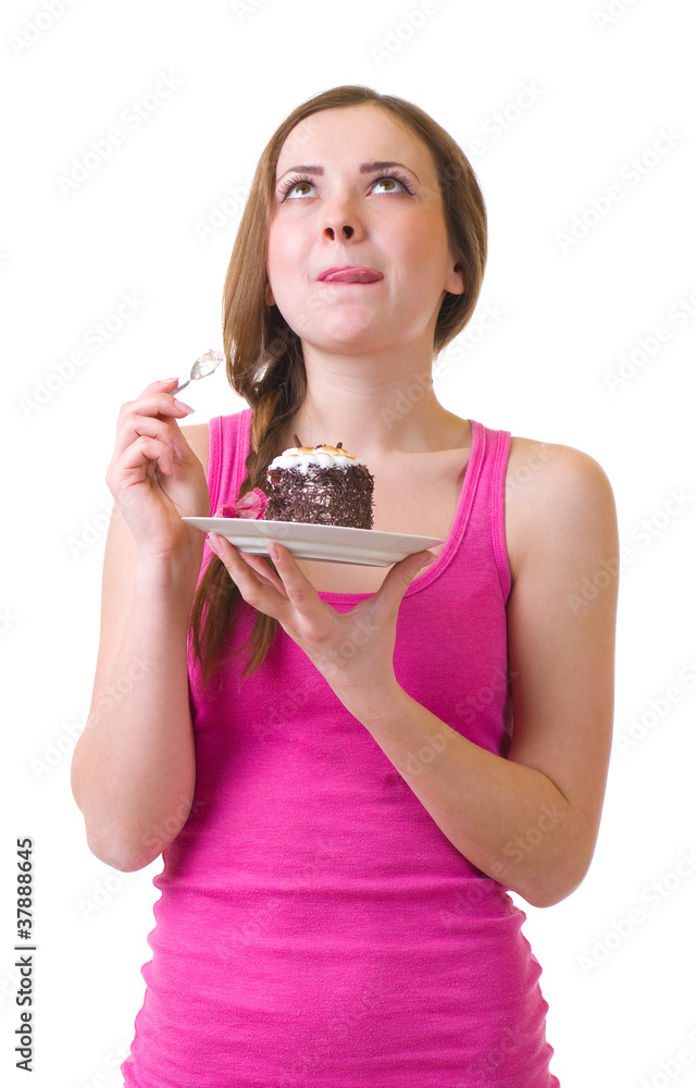 The beautiful young woman eat tasty cake The beautiful young woman eat tasty cake