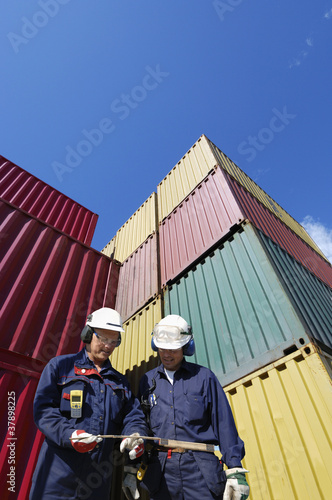 port workers and cargo containers