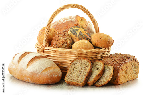 Composition with bread and rolls in wicker basket