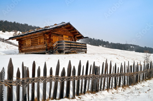 Old winter cottage with fence #37910431