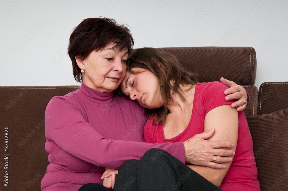 Big troubles - senior mother comforts daughter Big troubles - senior mother comforts daughter
