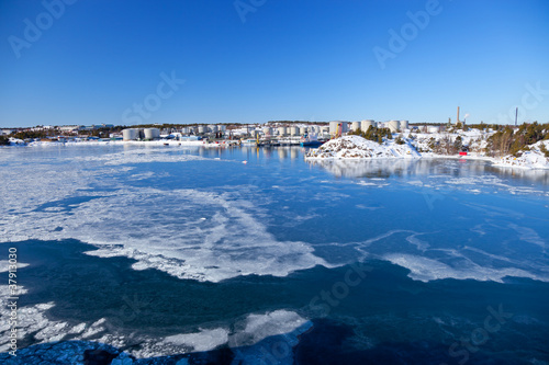 Quay port covered with ice. photo