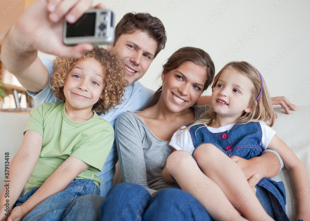 Family taking a photo of themselves