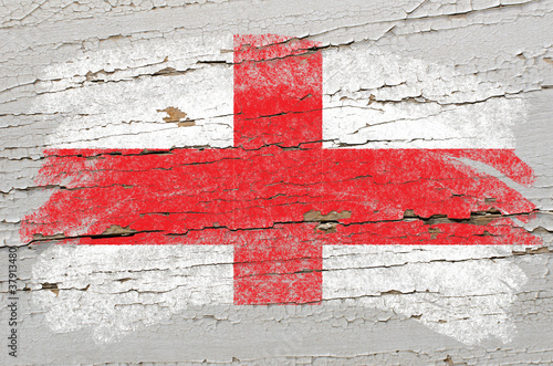 flag of england on grunge wooden texture painted with chalk