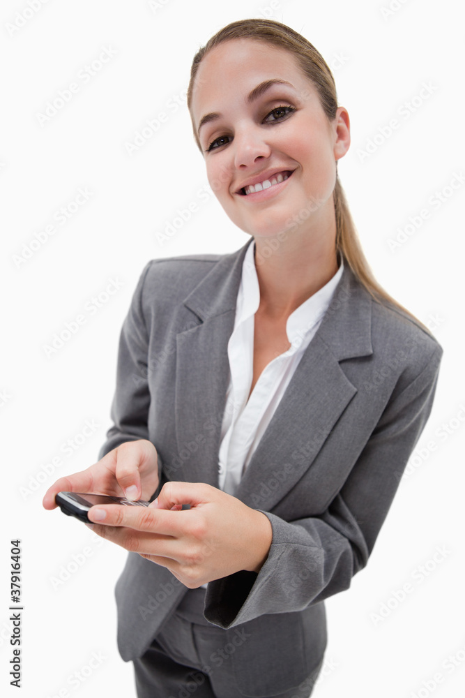 Portrait of a smiling businesswoman using a smartphone Portrait of a smiling businesswoman using a smartphone