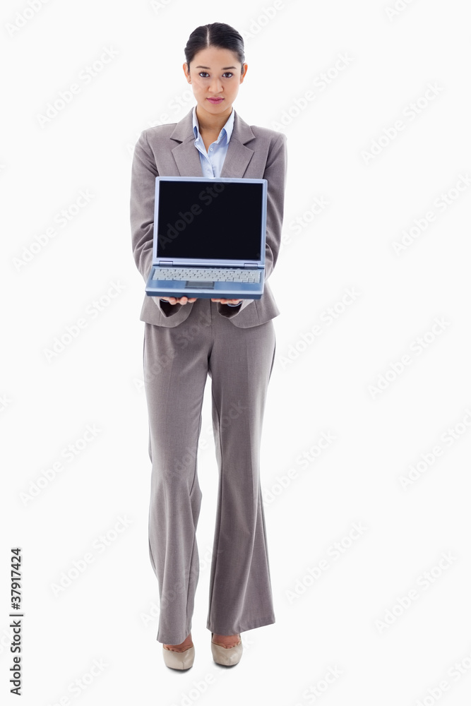 Portrait of a businesswoman showing a notebook Portrait of a businesswoman showing a notebook