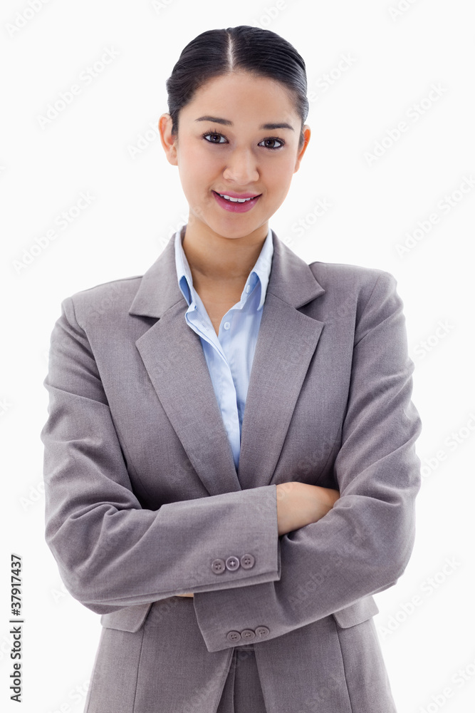 Portrait of a smiling brunette businesswoman posing with the arm Portrait of a smiling brunette businesswoman posing with the arm