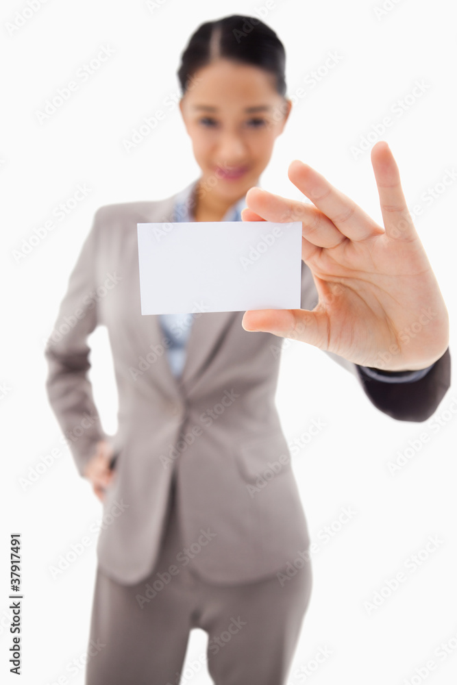 Portrait of a cute businesswoman showing a blank business card Portrait of a cute businesswoman showing a blank business card