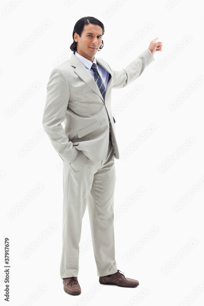 Portrait of a handsome businessman pointing at a copy space Portrait of a handsome businessman pointing at a copy space