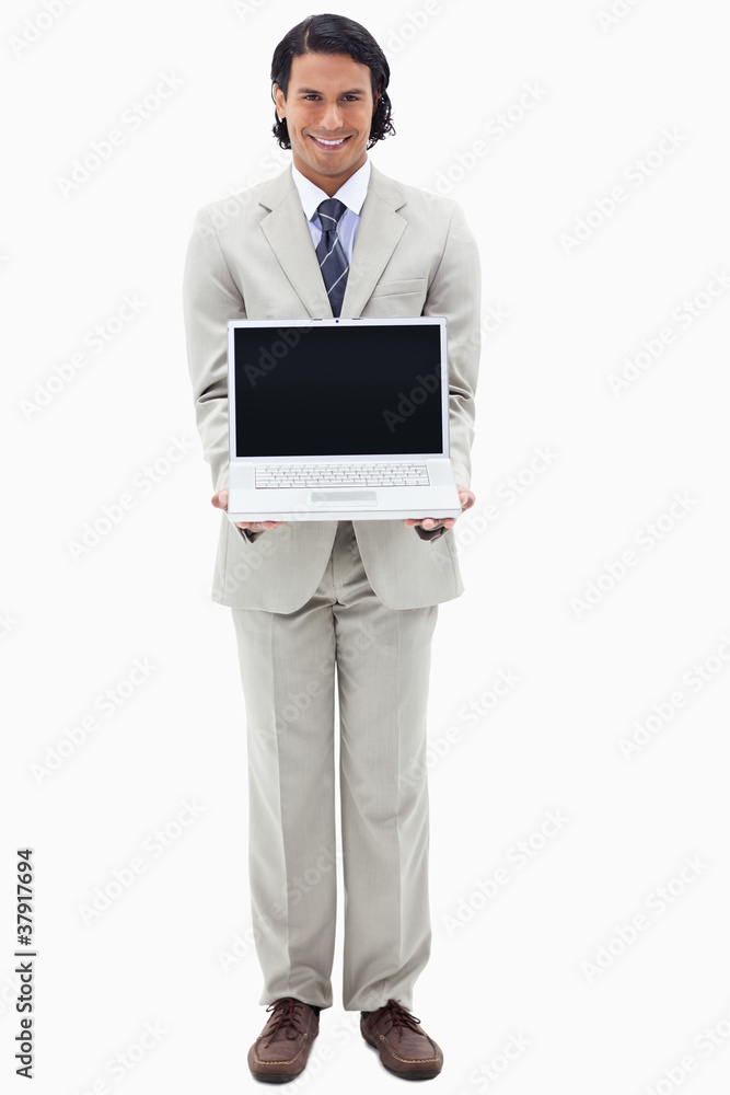 Portrait of a smiling businessman showing a notebook Portrait of a smiling businessman showing a notebook