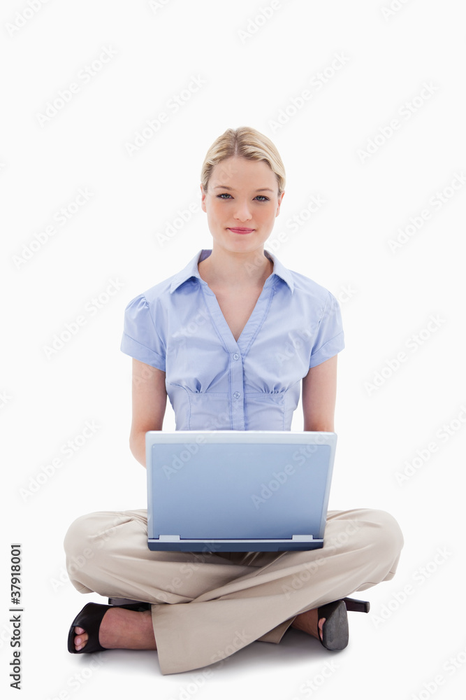 Woman sitting with her laptop