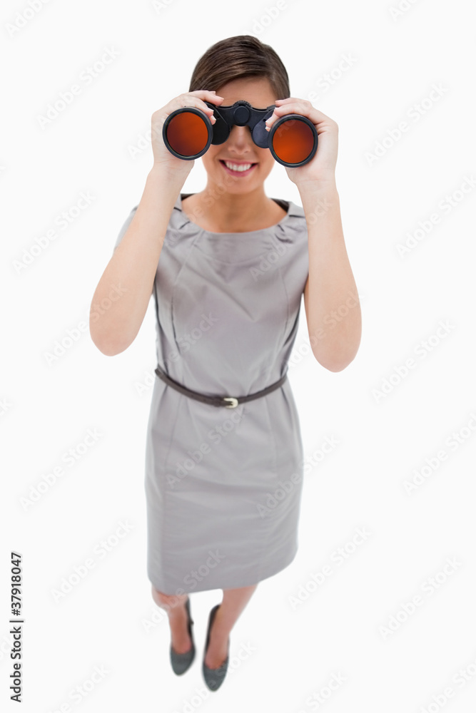 Woman using binoculars Woman using binoculars