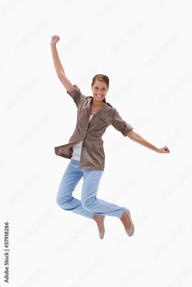 Smiling woman jumping