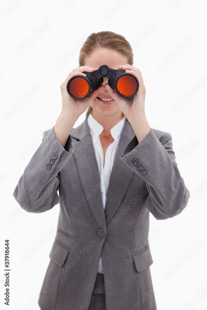Bank employee looking through spyglasses Bank employee looking through spyglasses