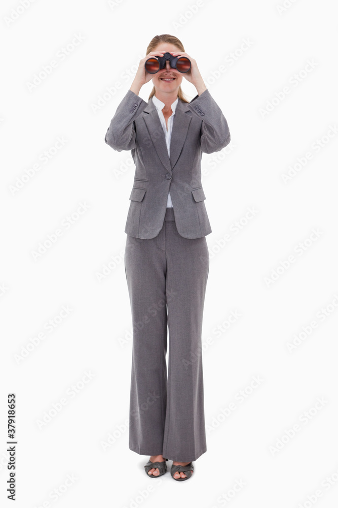 Bank employee using binoculars