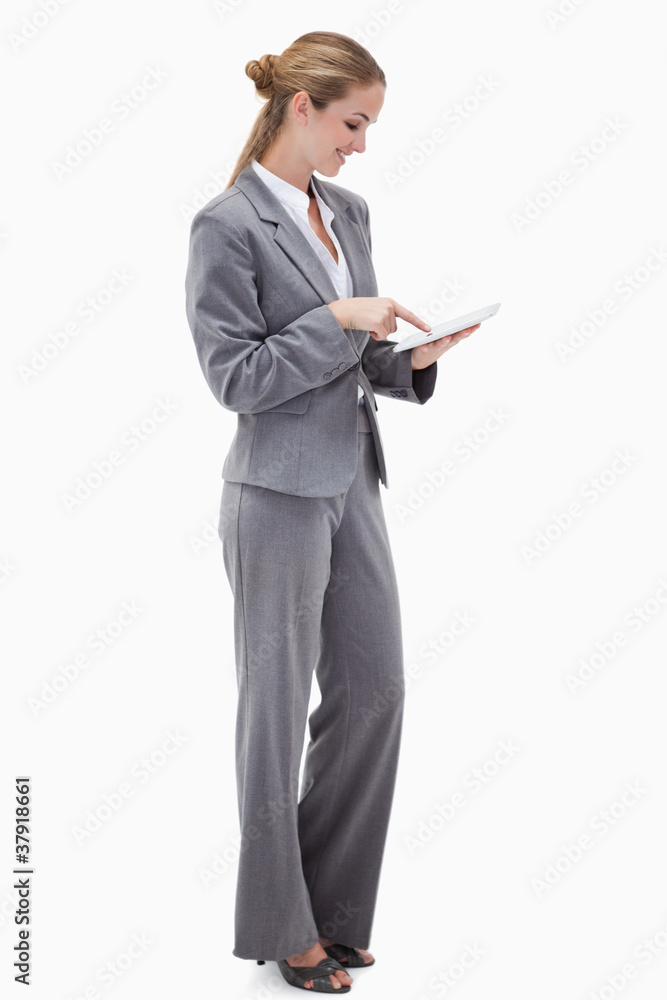 Side view of bank employee using tablet Side view of bank employee using tablet
