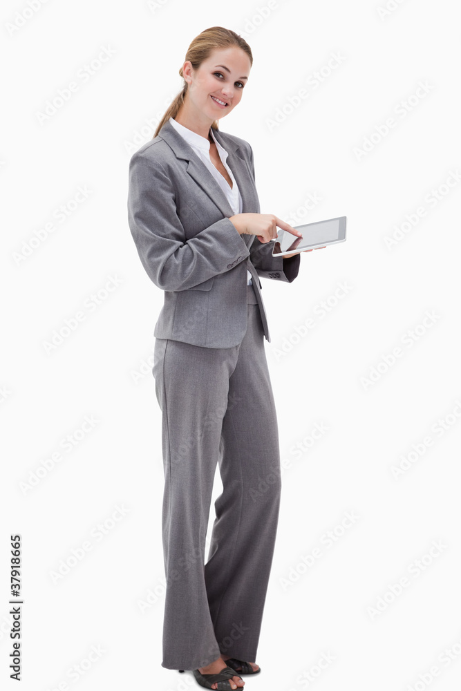Side view of smiling bank employee using tablet Side view of smiling bank employee using tablet