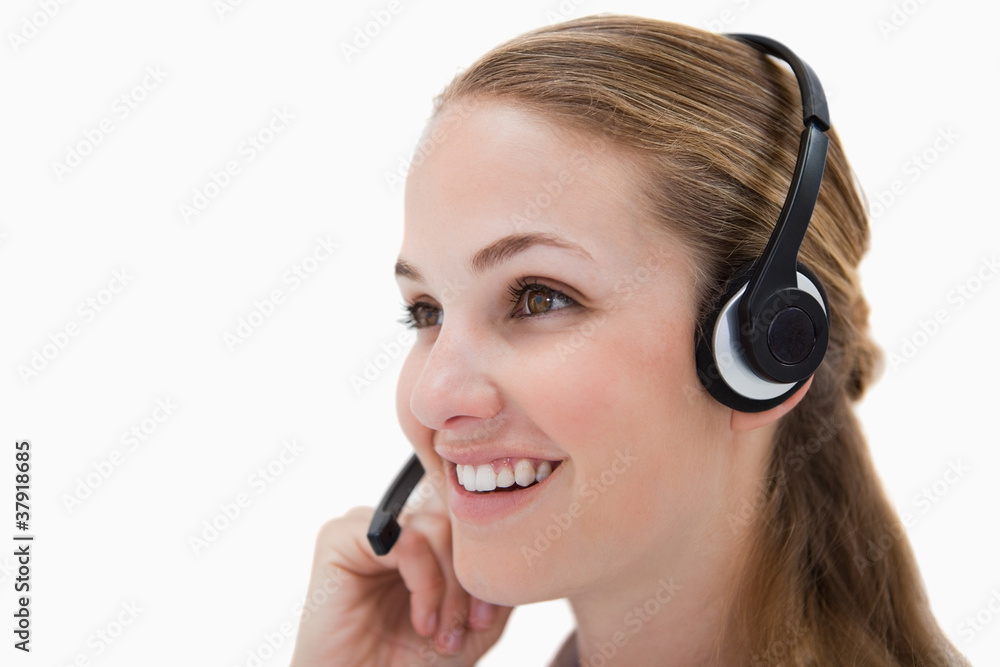 Side view of smiling call center agent Side view of smiling call center agent