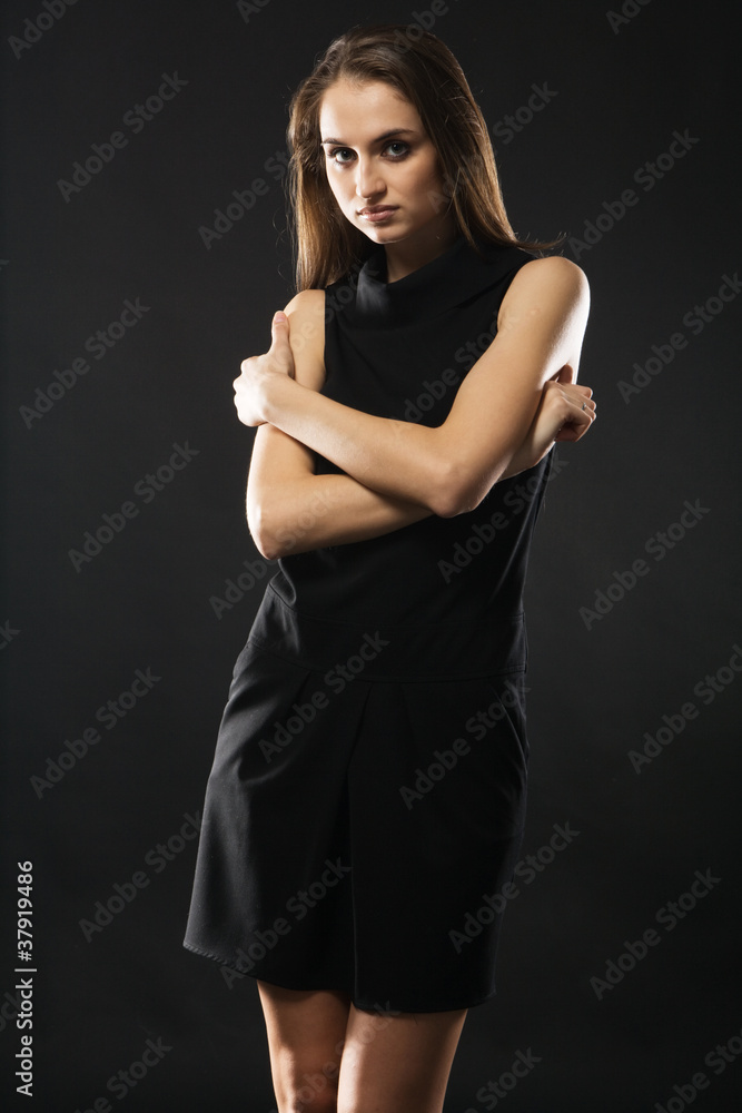 Beautiful fashion model in strict black dress Beautiful fashion model in strict black dress