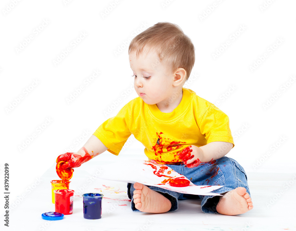 Adorable dirty child with paints Adorable dirty child with paints