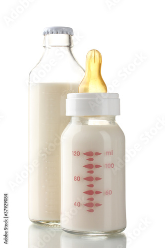 bottles of milk isolated on white