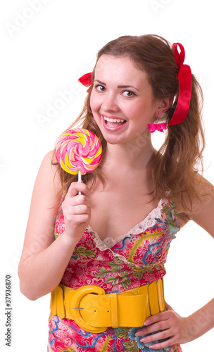 young girl with pink spiral lollipops