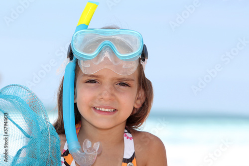 Little girl snorkeling.