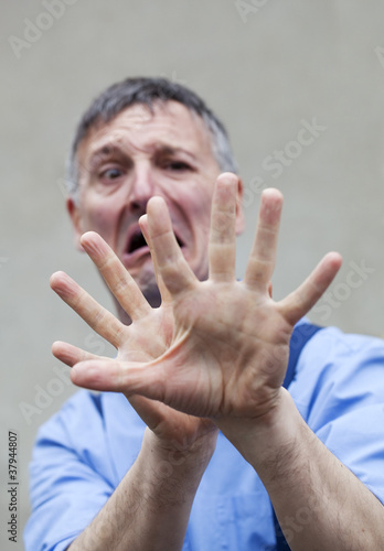 coward business man freaking out