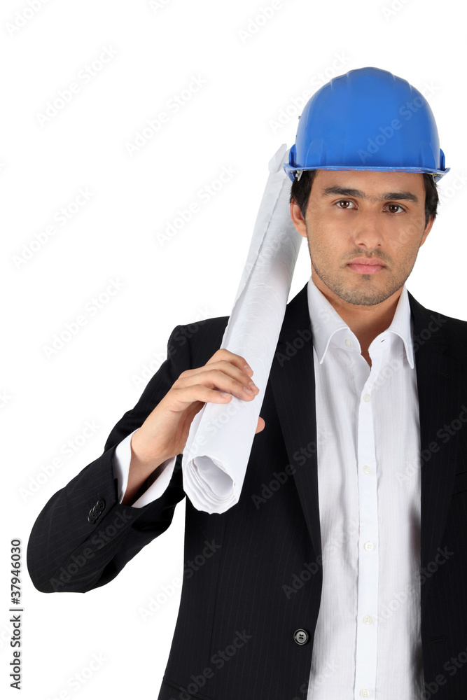 Architect carrying plans in front of white background Architect carrying plans in front of white background