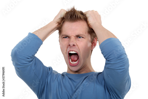 Photography Man screaming and pulling his hair