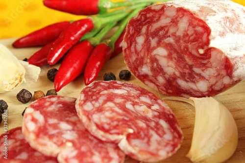 Sliced salami with spices