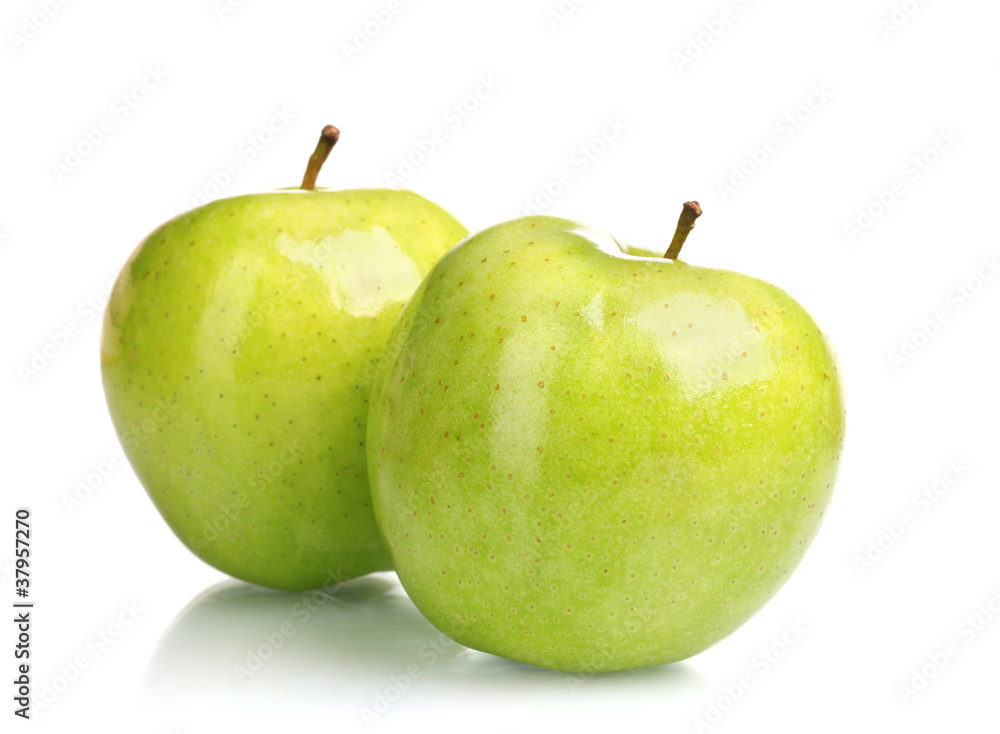 two juicy green apples isolated on white two juicy green apples isolated on white
