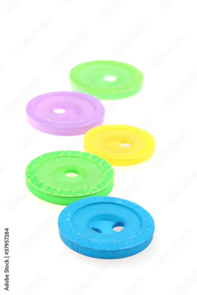 bright sewing buttons isolated on white bright sewing buttons isolated on white
