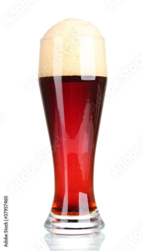 red beer with foam in glass isolated on white